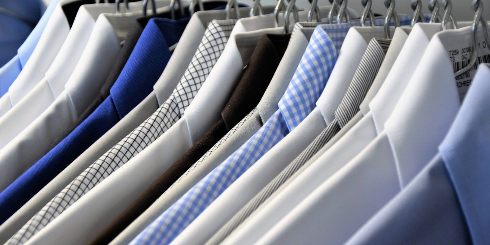 A rail of freshly pressed shirts ready for collection